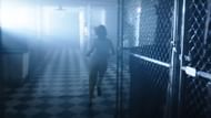 Mia running from the basement (Image via YouTube/Warner Bros.)